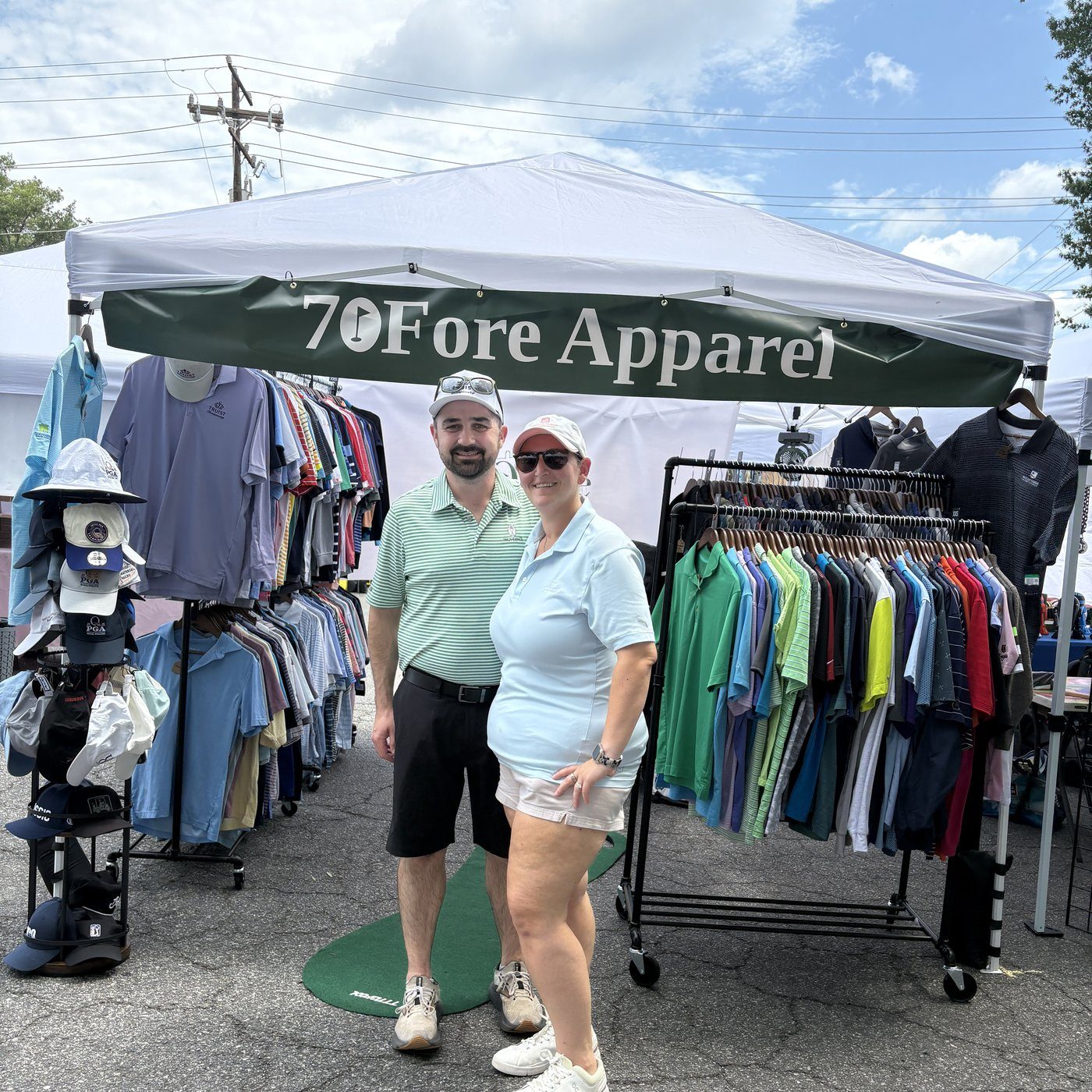 Katie and Andrew, co-founders of 70Fore Apparel, at a Charlotte pop-up market